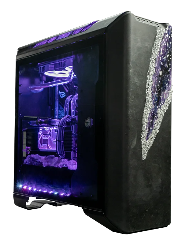 This custom computer is modeled after an open geode. The front panel uses glass to emulate the appearance of one, and the interior uses a similar technique and purple lighting to add to the overall theme